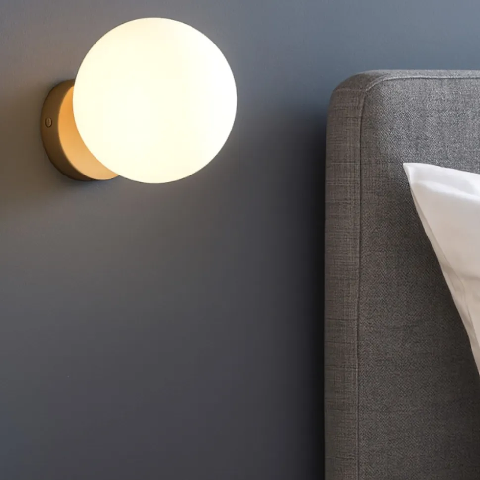 Applique comodino camera da letto ondaluce pallina oro sfera vetro