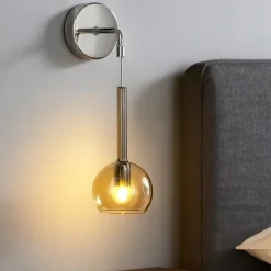Applique cromo per comodini da letto sfera vetro ambra