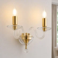 Applique da parete a 2 bracci in vetro trasparente e finiture oro