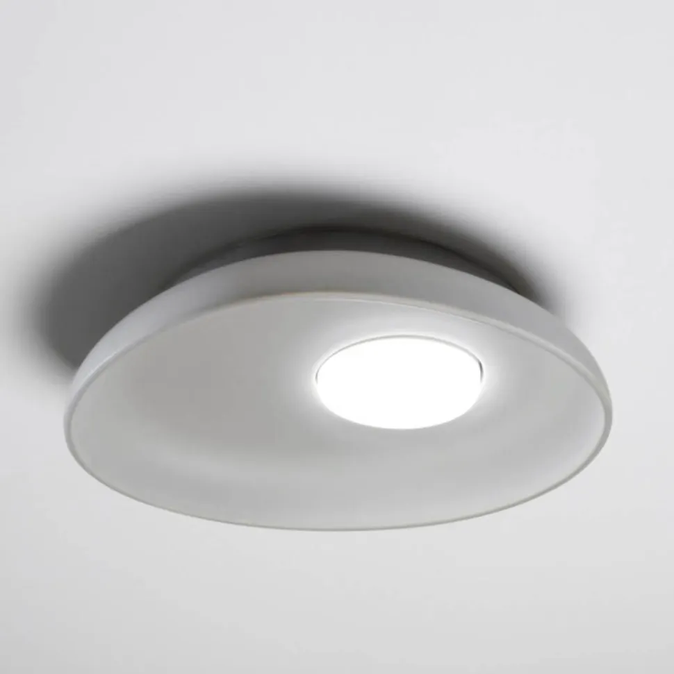 Applique moderna vivida reloaux ceramica ovale grigia