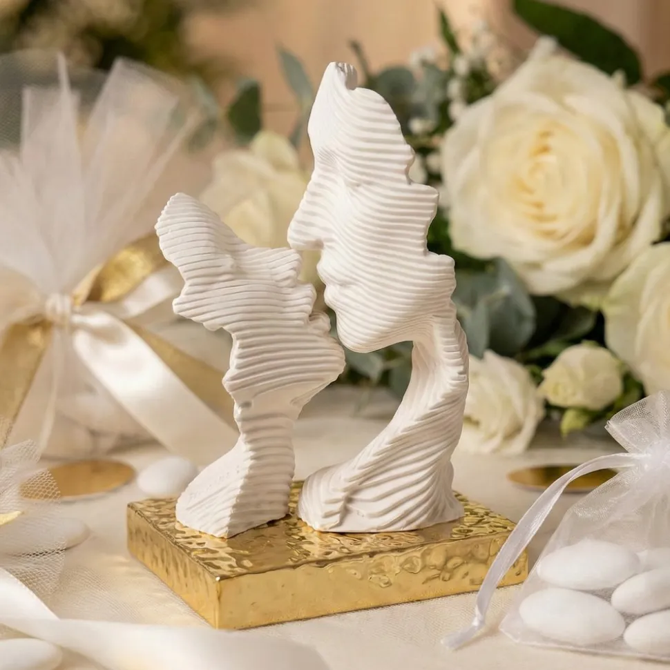 Bomboniera bacio stilizzato oro design moderna bongelli preziosi