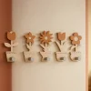 Ganci appendiabiti moderno da parete piantine miste legno colore sabbia rosata