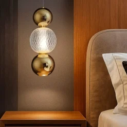 Lampada da comodino pendente per camera da letto sfere oro