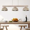 Lampadario bilanciere di legno cupole in metallo sabbia per cucina
