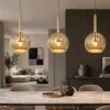 Lampadario per cucina sfere vetro ambra